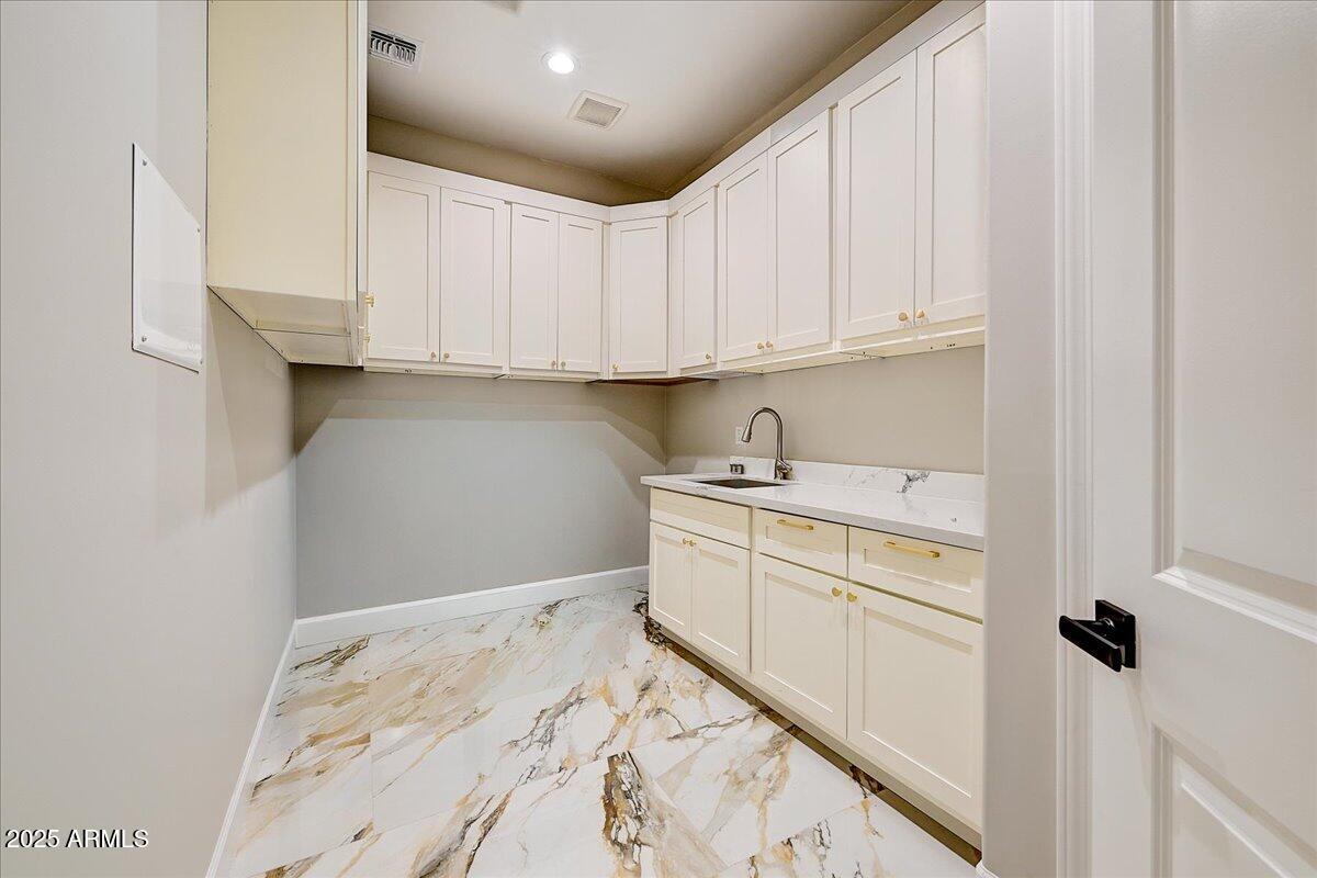 27730 North 35th Avenue Phoenix, AZ 85083 - Photo 28 of 37 a room with a bed and a cabinets