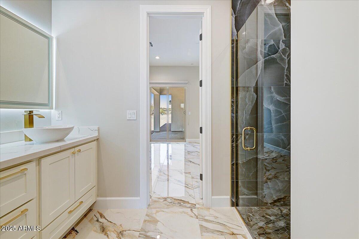27730 North 35th Avenue Phoenix, AZ 85083 - Photo 31 of 37 a bathroom with a sink and a mirror