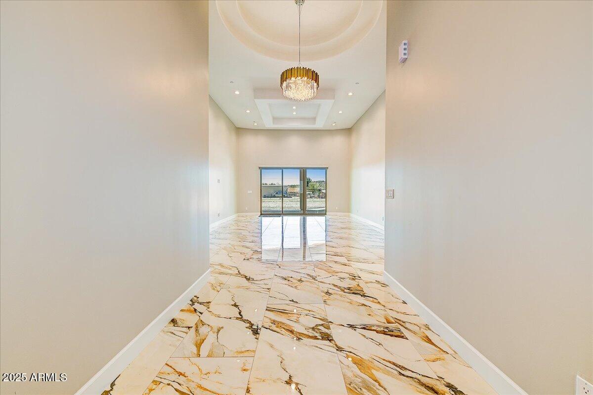 27730 North 35th Avenue Phoenix, AZ 85083 - Photo 4 of 37 a front door view of a chandelier