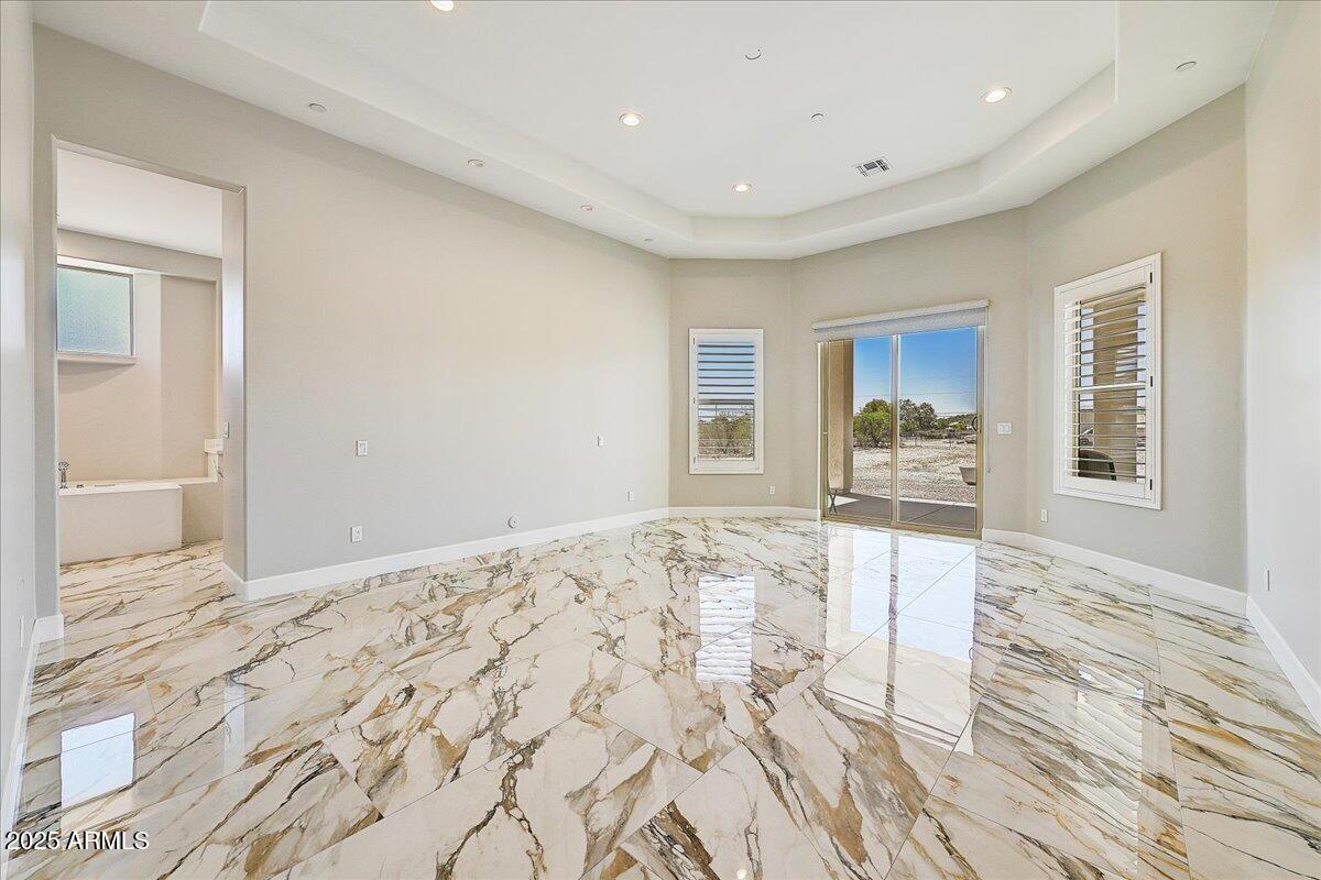 27730 North 35th Avenue Phoenix, AZ 85083 - Photo 8 of 37 a view of empty room with wooden floor