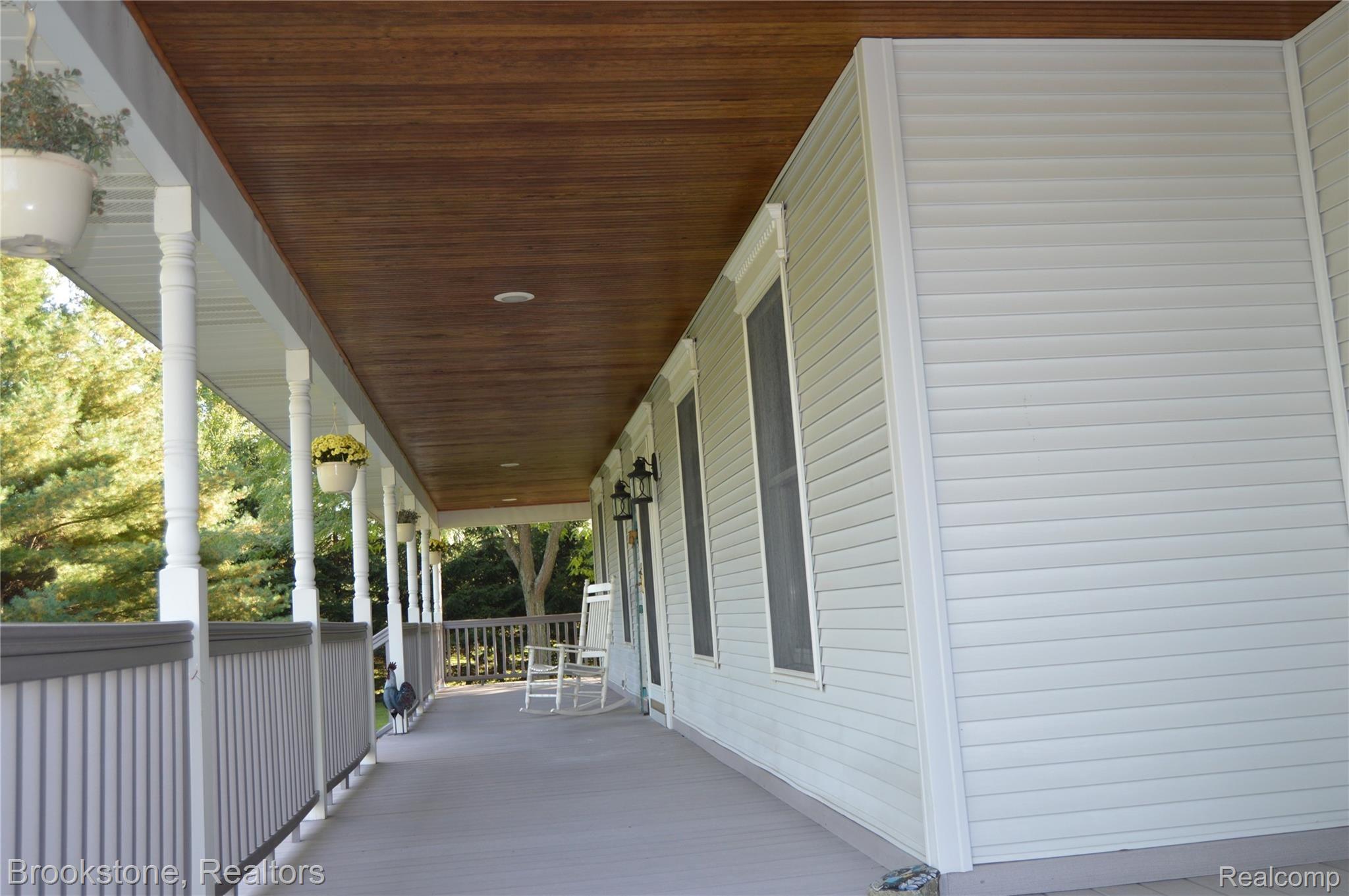 12447 Field Road Clio, MI 48420 - Photo 12 of 37 12447 Field Rd Clio MI 48420 front porch