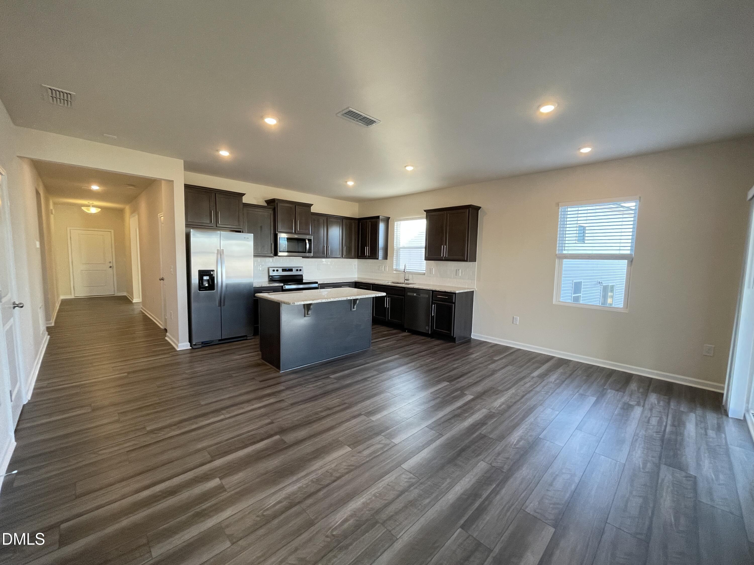 3521 New Town Road Raleigh, NC 27604 - Photo 11 of 29 a view of kitchen with wooden floor and electronic appliances
