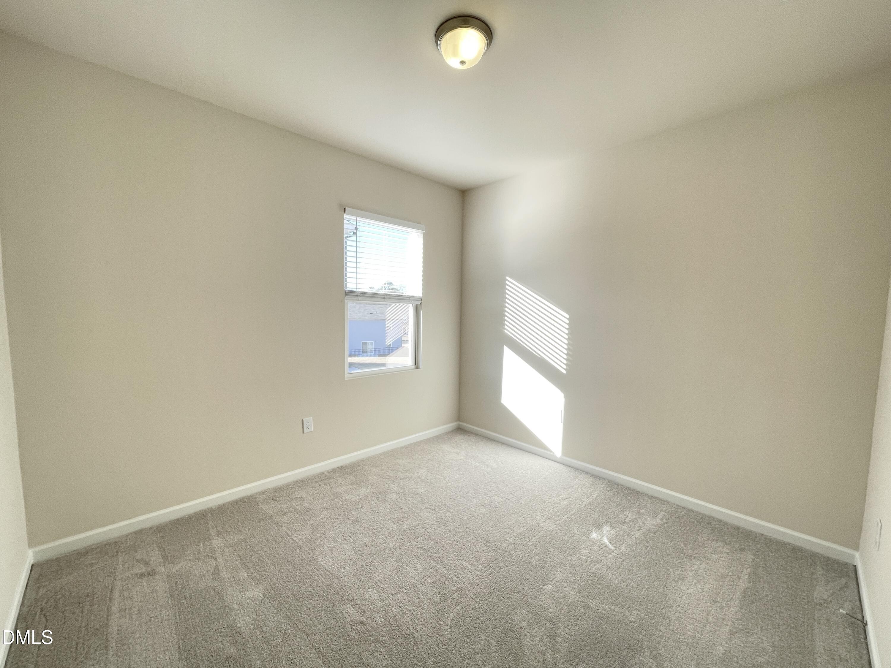 3521 New Town Road Raleigh, NC 27604 - Photo 15 of 29 an empty room with windows