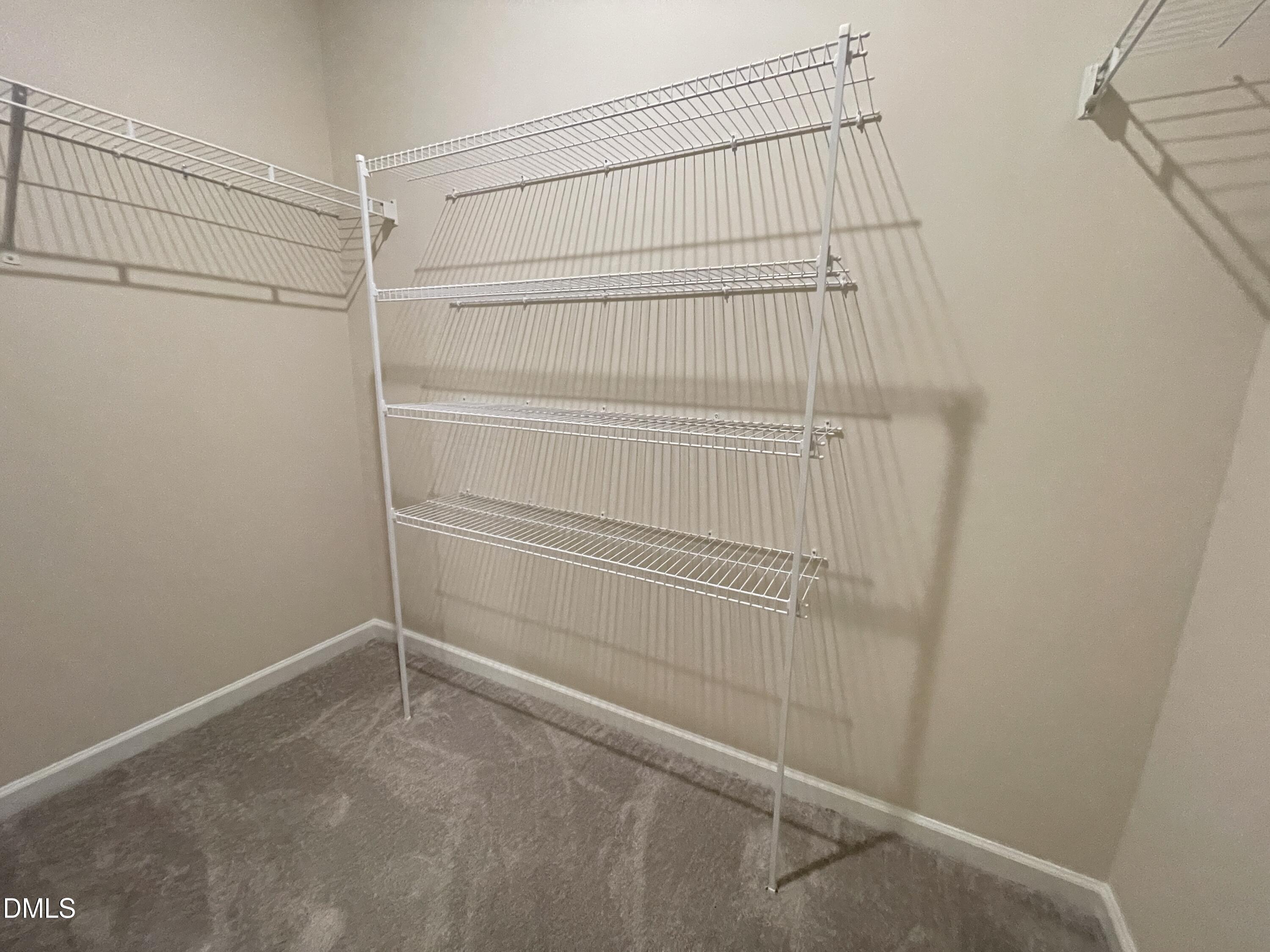 3521 New Town Road Raleigh, NC 27604 - Photo 25 of 29 a view of an empty walk in closet