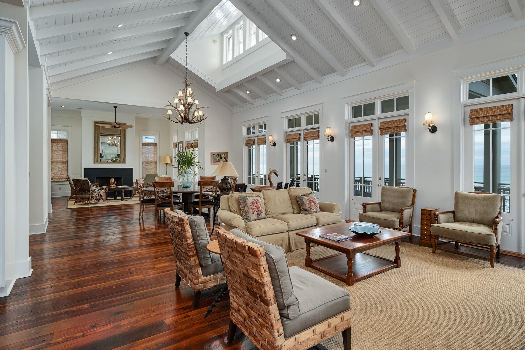 244 West Bermuda Drive Santa Rosa Beach, FL 32459 - Photo 14 of 66 a living room with fireplace furniture and a chandelier