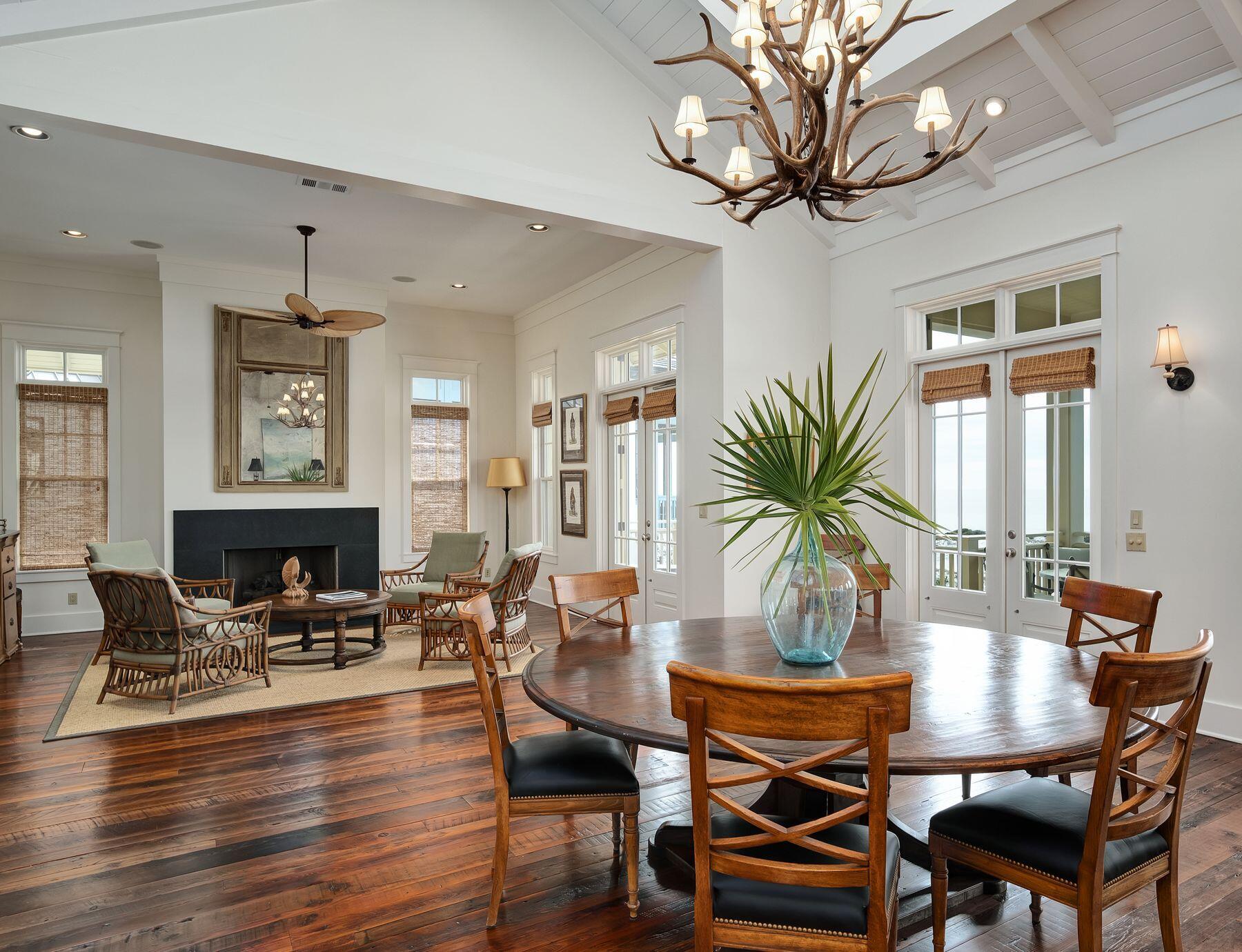 244 West Bermuda Drive Santa Rosa Beach, FL 32459 - Photo 15 of 66 a living room with furniture a large window and wooden floor