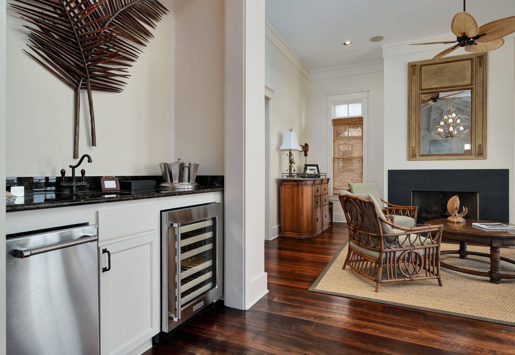 244 West Bermuda Drive Santa Rosa Beach, FL 32459 - Photo 24 of 66 a kitchen with a table chairs and a refrigerator