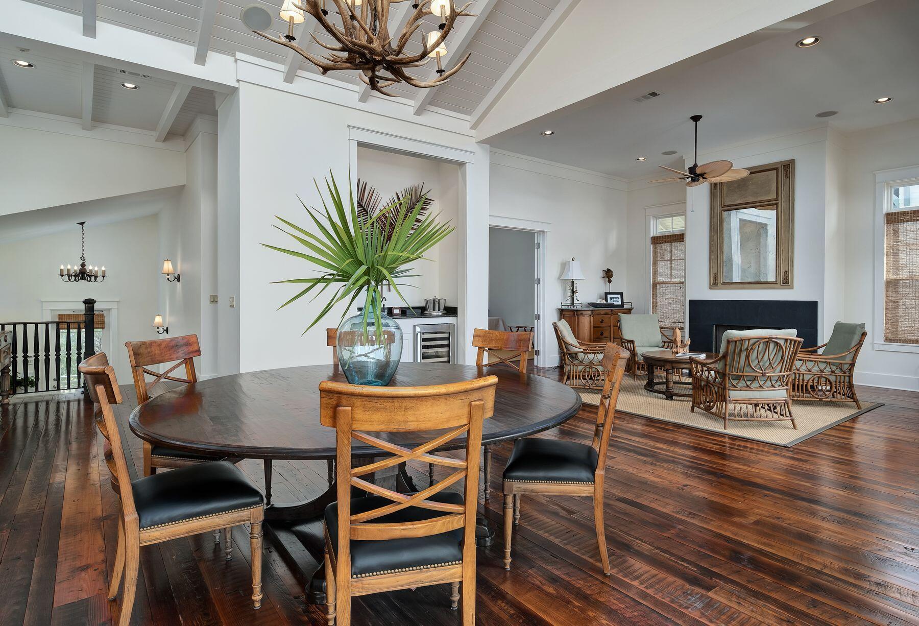 244 West Bermuda Drive Santa Rosa Beach, FL 32459 - Photo 25 of 66 a view of a dining room with furniture and wooden floor