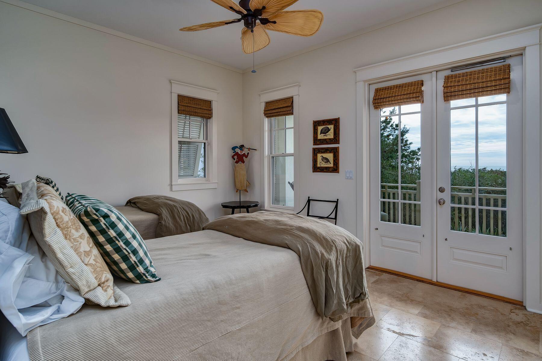 244 West Bermuda Drive Santa Rosa Beach, FL 32459 - Photo 32 of 66 a bedroom with a bed and a window