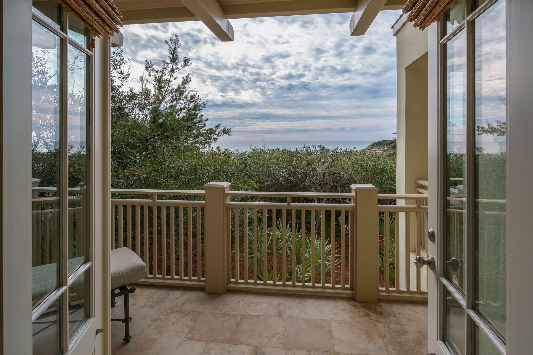 244 West Bermuda Drive Santa Rosa Beach, FL 32459 - Photo 34 of 66 a view of a chairs with a glass door
