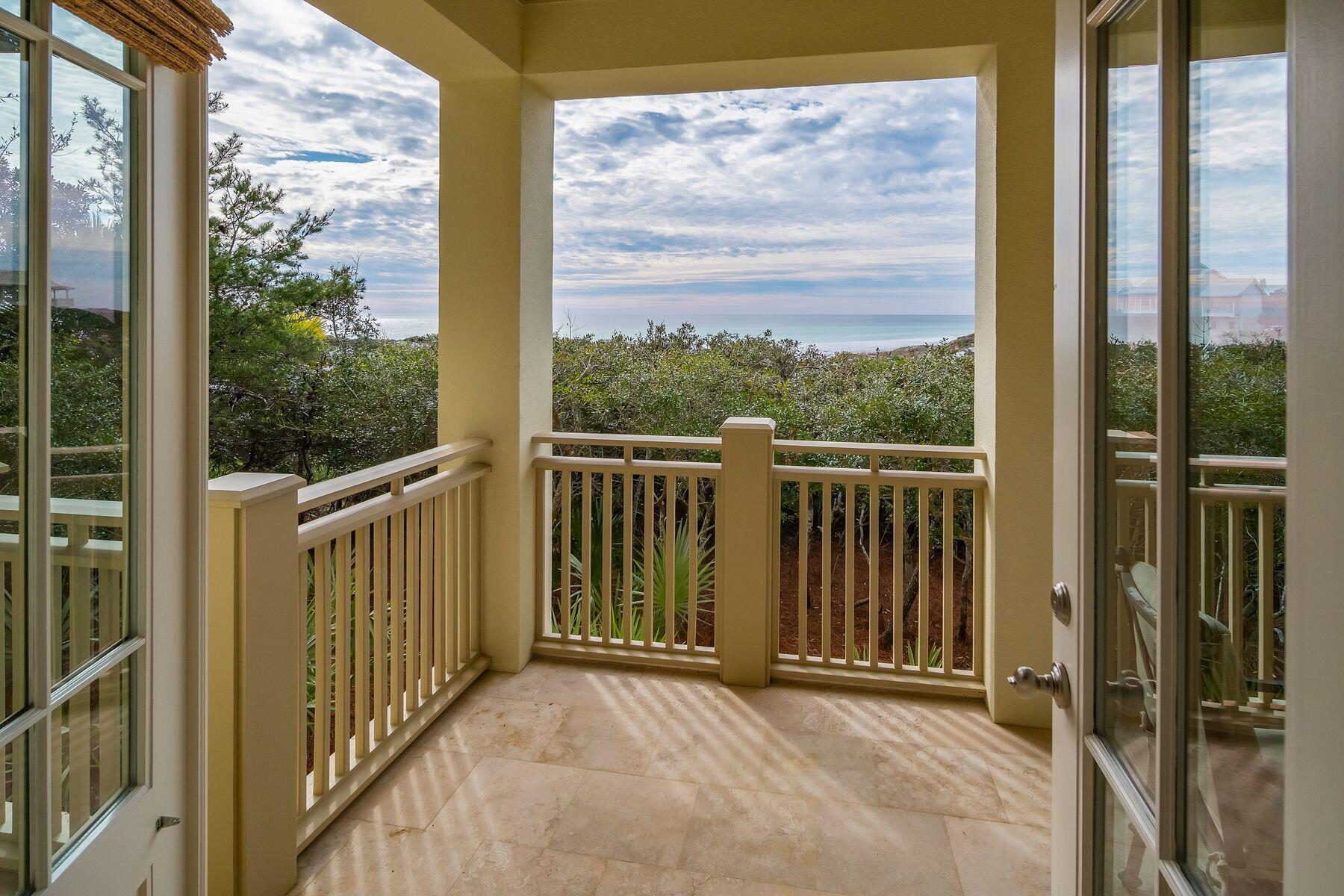 244 West Bermuda Drive Santa Rosa Beach, FL 32459 - Photo 37 of 66 a view of a balcony with a floor to ceiling window