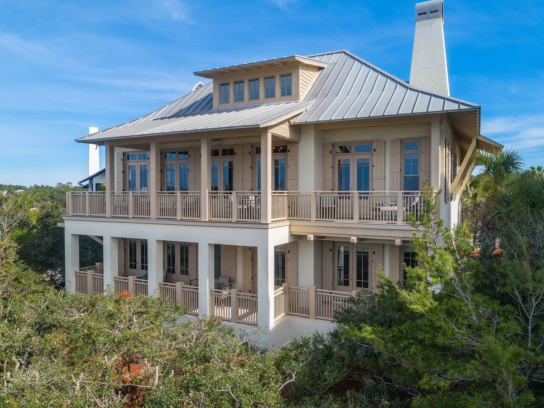 244 West Bermuda Drive Santa Rosa Beach, FL 32459 - Photo 47 of 66 a front view of a house with a porch
