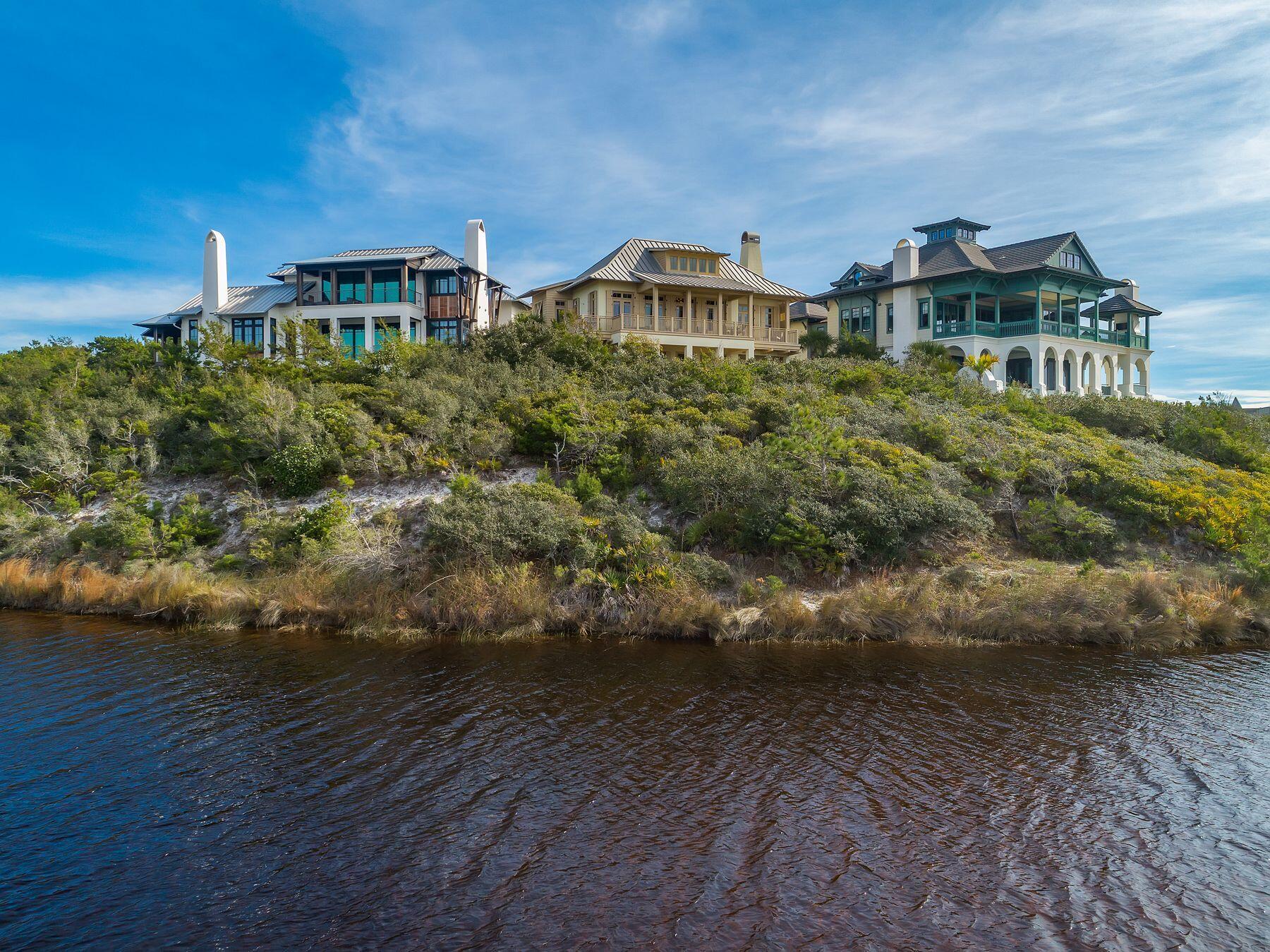244 West Bermuda Drive Santa Rosa Beach, FL 32459 - Photo 48 of 66 a view of a houses with a yard and plants