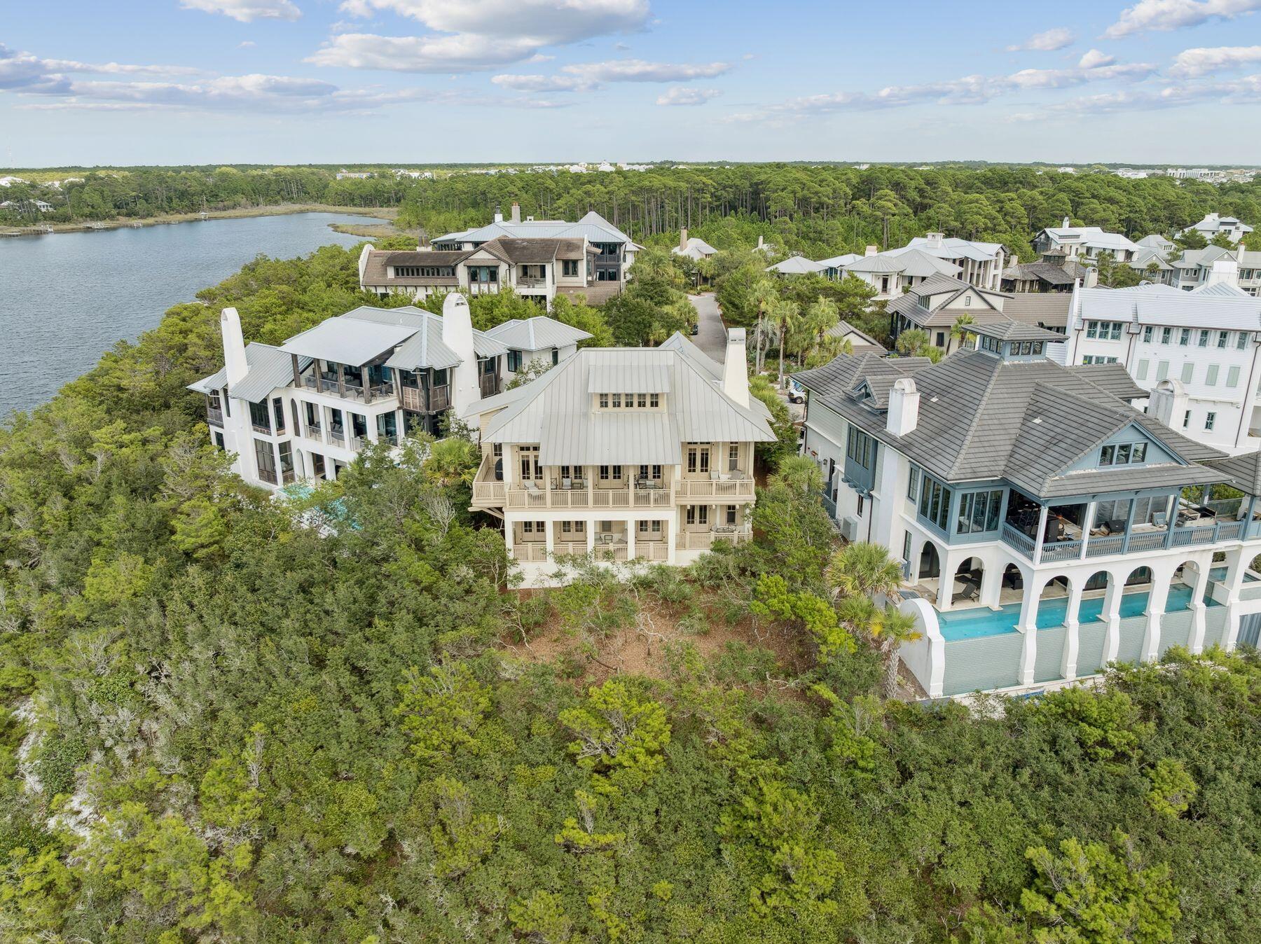 244 West Bermuda Drive Santa Rosa Beach, FL 32459 - Photo 49 of 66 an aerial view of residential building with lake view and mountain view