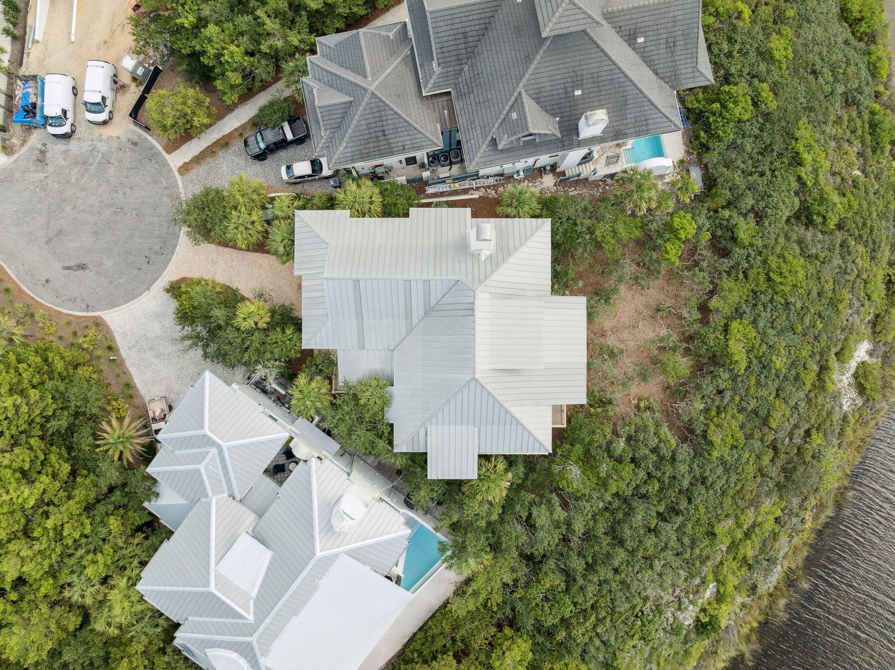 244 West Bermuda Drive Santa Rosa Beach, FL 32459 - Photo 50 of 66 an aerial view of a house with a yard and a large tree