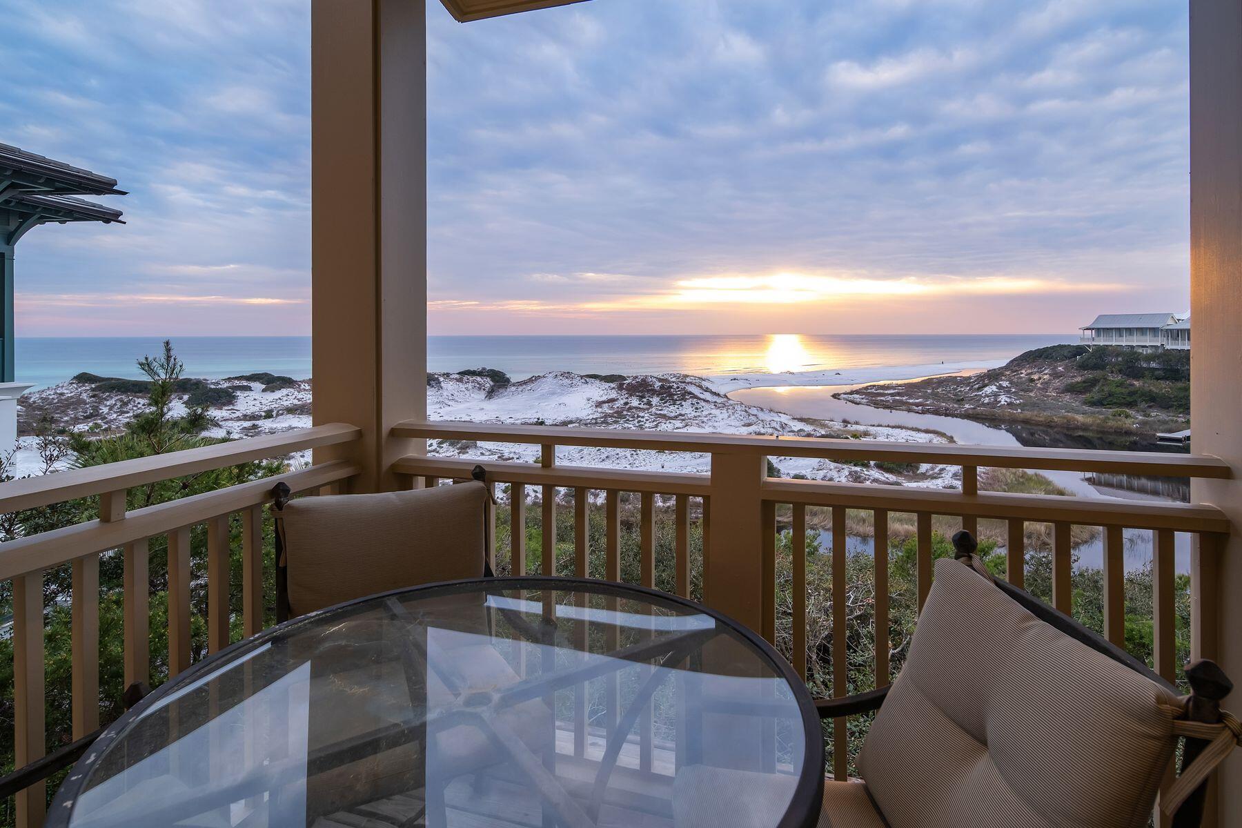 244 West Bermuda Drive Santa Rosa Beach, FL 32459 - Photo 54 of 66 a view of a balcony with a table and chairs