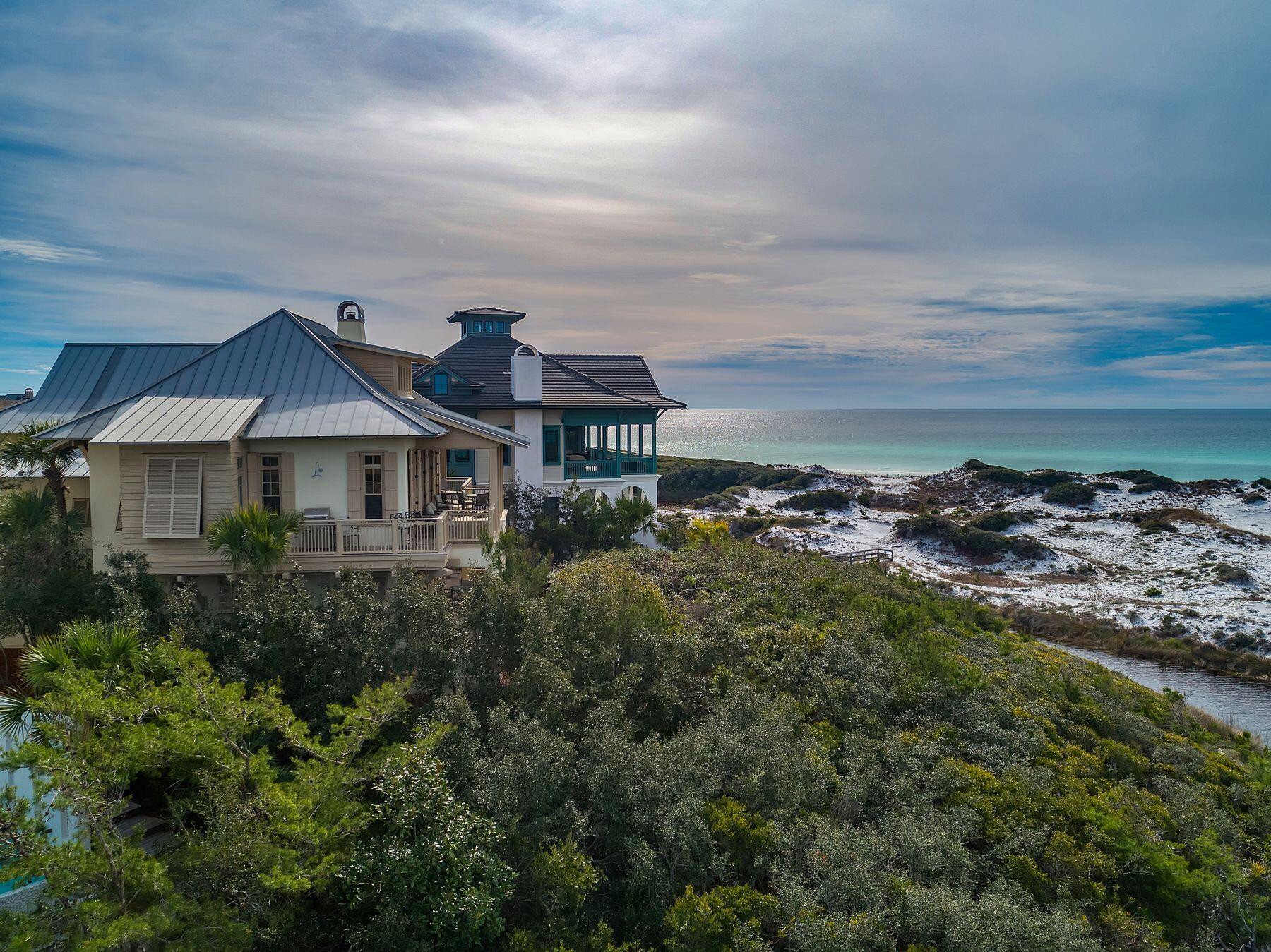 244 West Bermuda Drive Santa Rosa Beach, FL 32459 - Photo 56 of 66 a aerial view of a house next to a yard