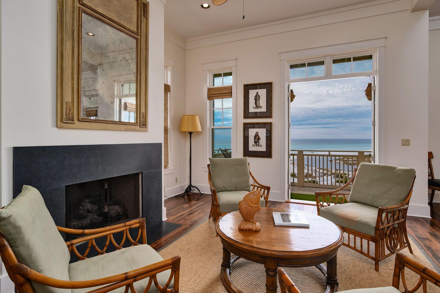 244 West Bermuda Drive Santa Rosa Beach, FL 32459 - Photo 6 of 66 a living room with furniture and a fireplace