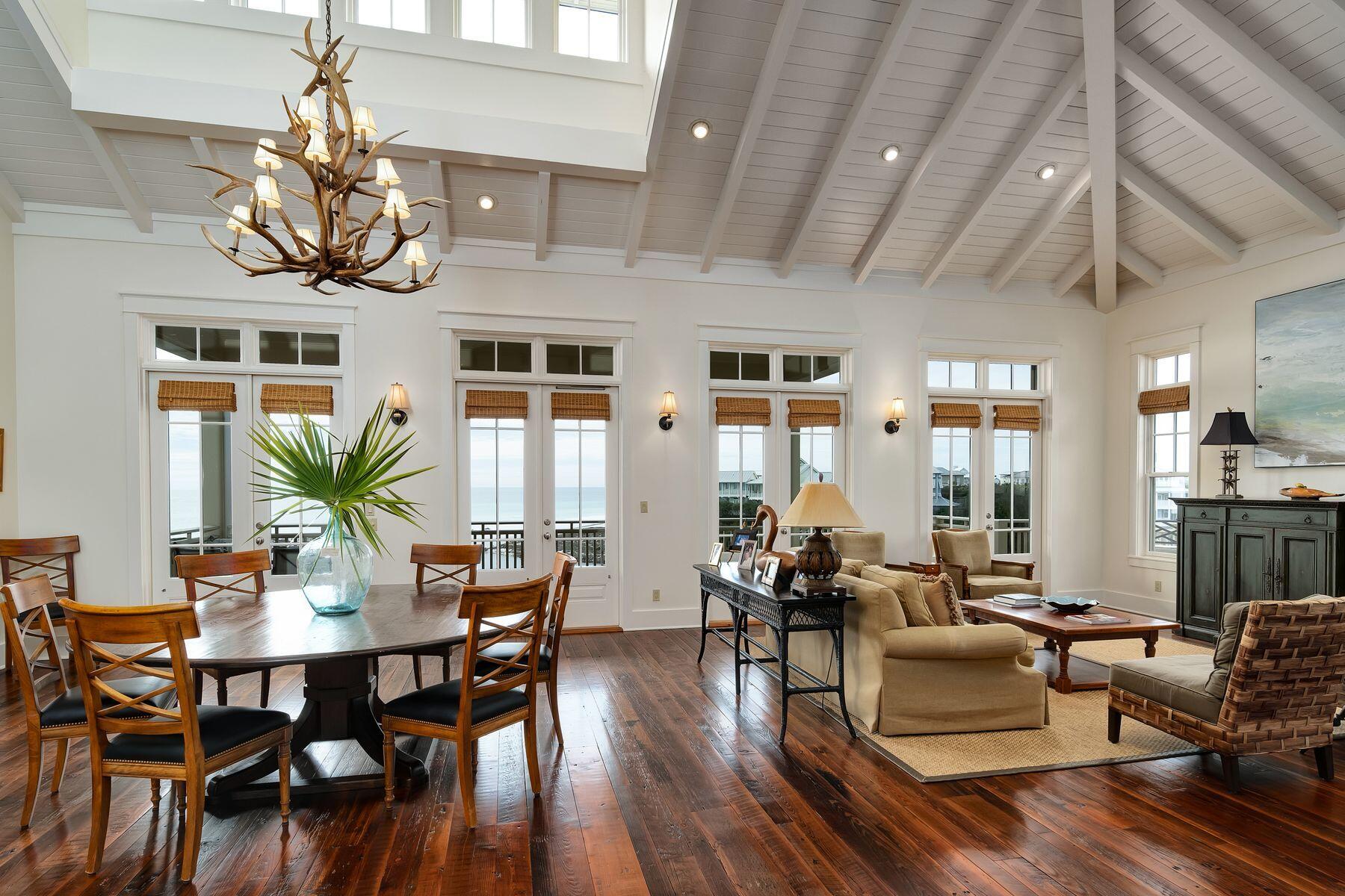 244 West Bermuda Drive Santa Rosa Beach, FL 32459 - Photo 7 of 66 a view of a dining room with furniture window and wooden floor