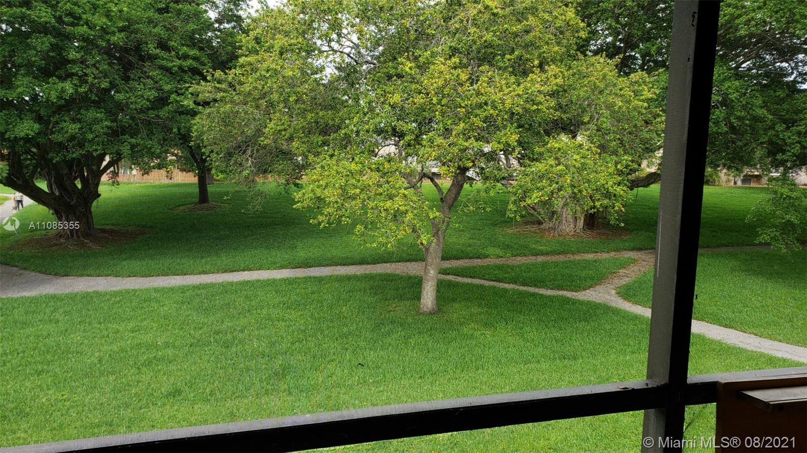 14857 Southwest 104th Street, Unit 9205 Miami, FL 33196 - Photo 2 of 11 a view of a park
