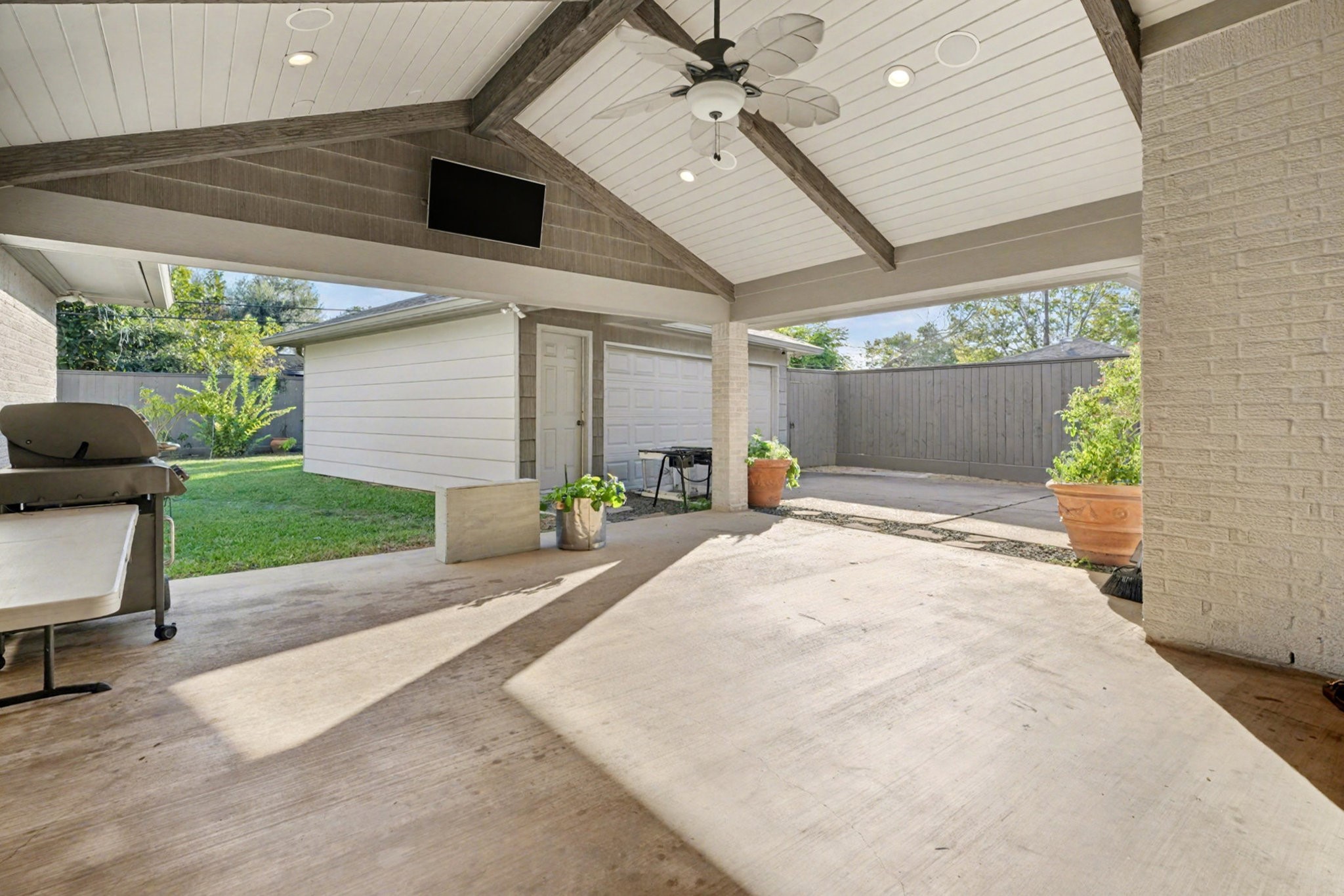 8515 Edgemoor Drive Houston, TX 77036 - Photo 32 of 33 a house with yard and a potted plant
