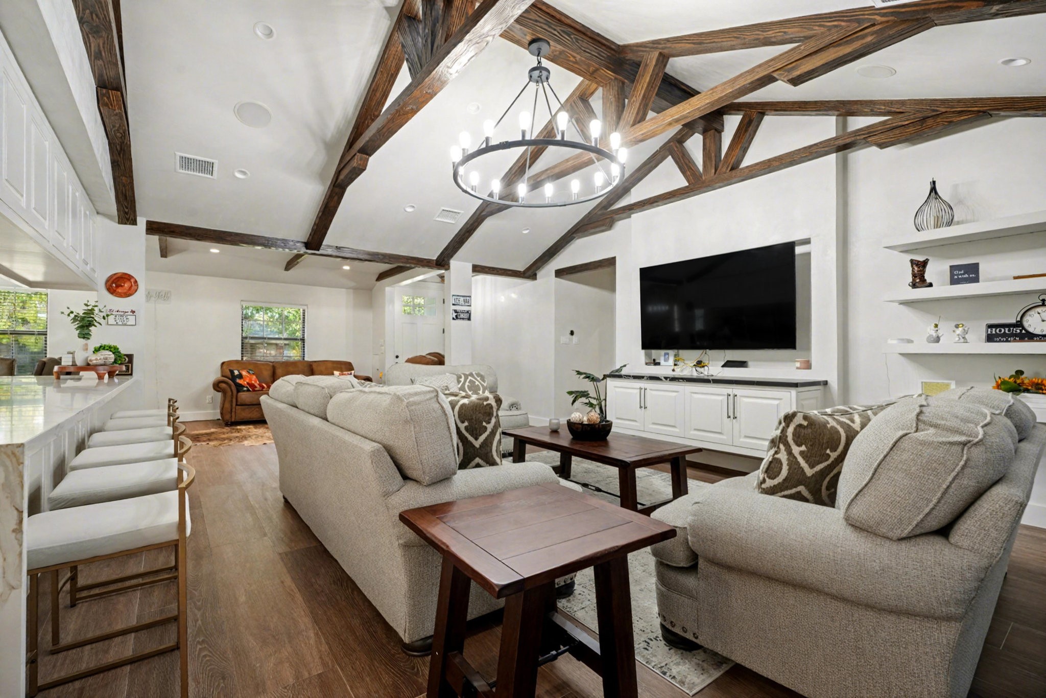 8515 Edgemoor Drive Houston, TX 77036 - Photo 6 of 33 a living room with furniture and a flat screen tv