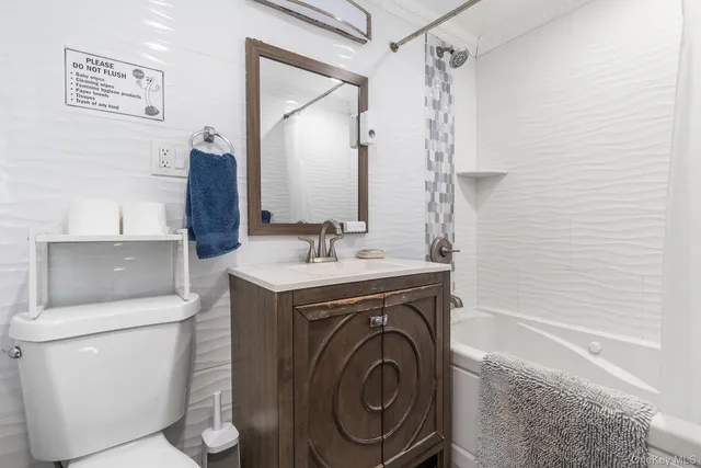 a bedroom with a bed and a walk in closet