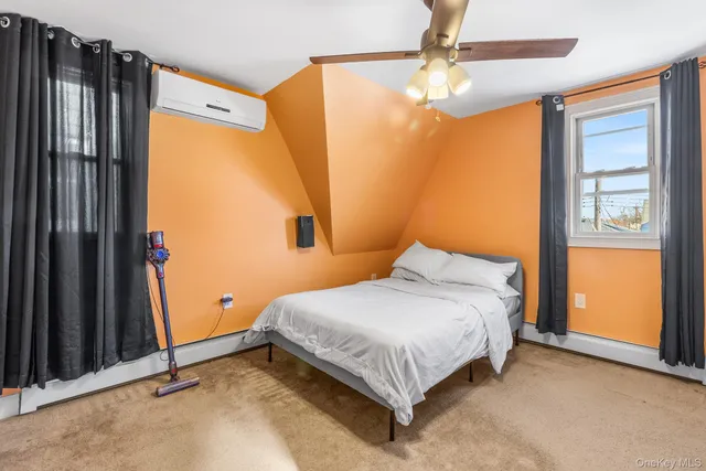 a view of multiple houses with a street