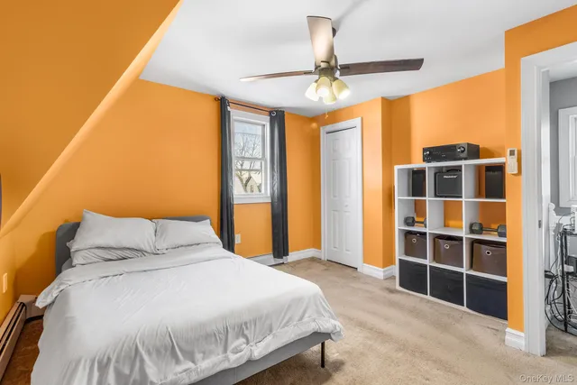 a view of a house with snow on the road