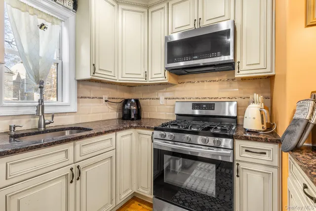 a view of a hallway with washer and dryer