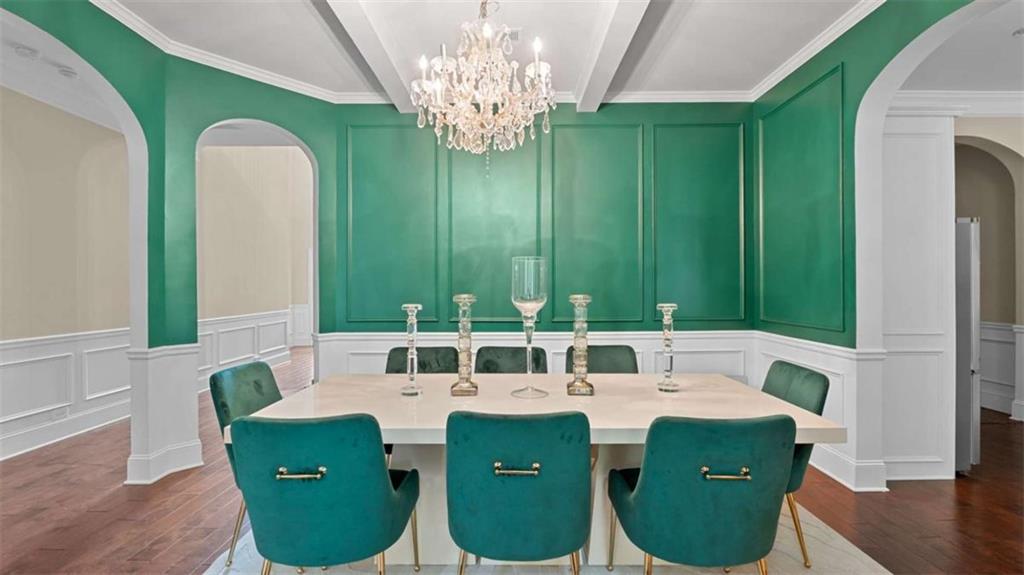 2328 Austin Common Way Dacula, GA 30019 - Photo 18 of 52 a dining room with a table and chairs