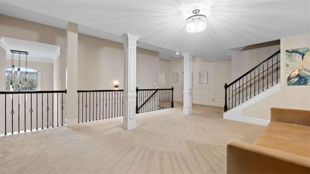 2328 Austin Common Way Dacula, GA 30019 - Photo 31 of 52 a view of a hallway with staircase