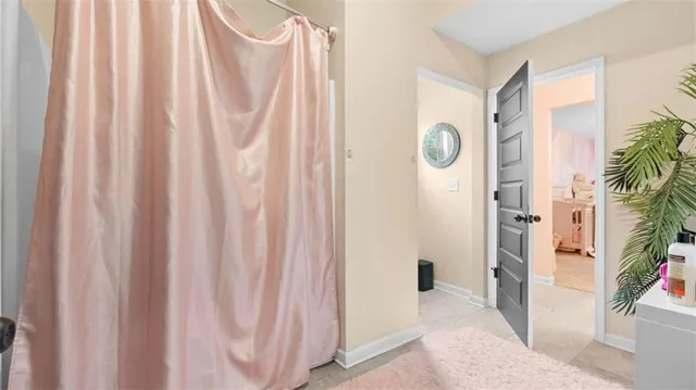 a bathroom with a sink vanity and a mirror