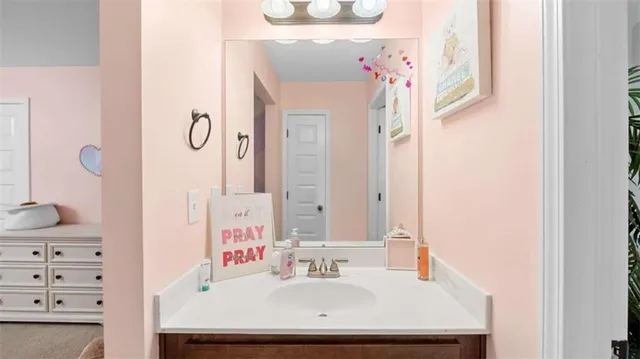 a bedroom with furniture and a chandelier