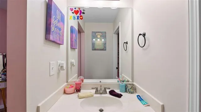 a bed room with furniture and a flat screen tv