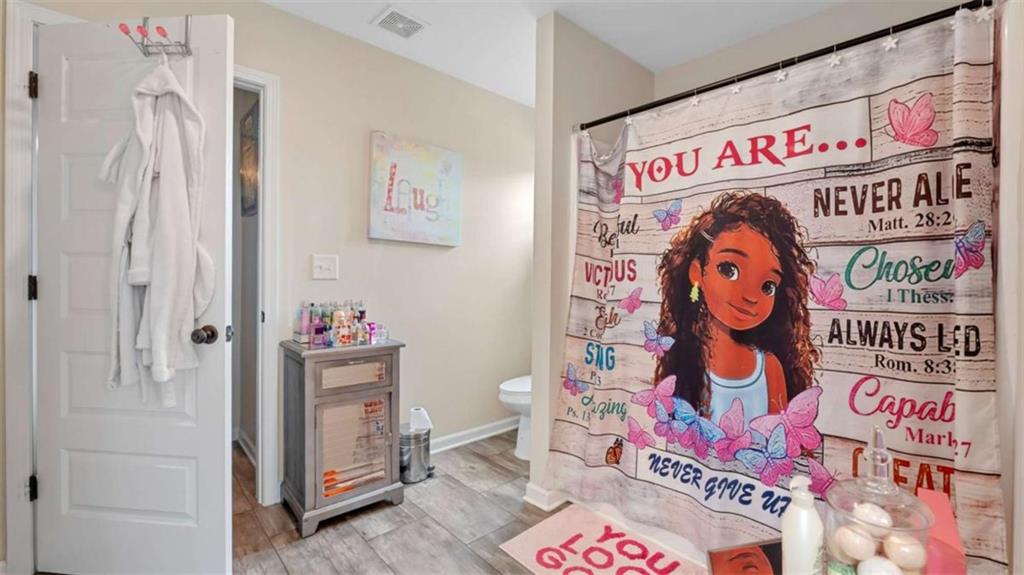 2328 Austin Common Way Dacula, GA 30019 - Photo 43 of 52 a utility room with fridge and wall