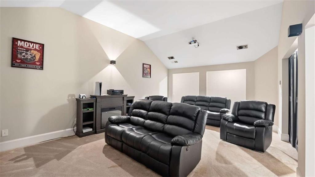 2328 Austin Common Way Dacula, GA 30019 - Photo 52 of 52 a living room with furniture