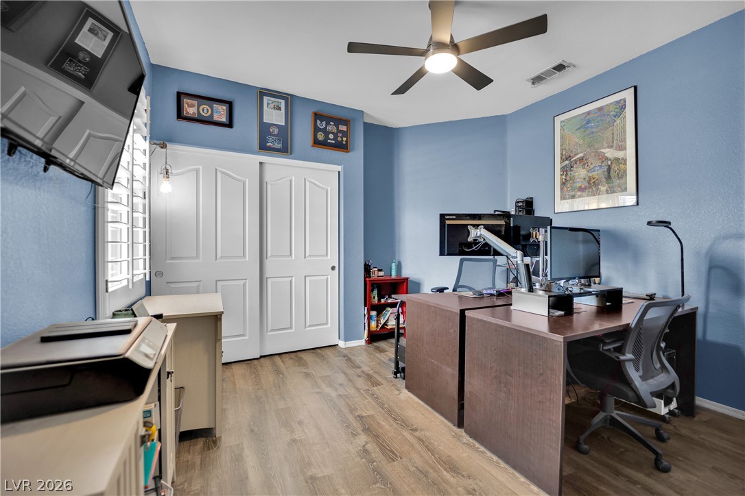 1724 Millstream Way Henderson, NV 89074 - Photo 25 of 60 A well-appointed office space offers functional design and practical comforts for daily productivity.