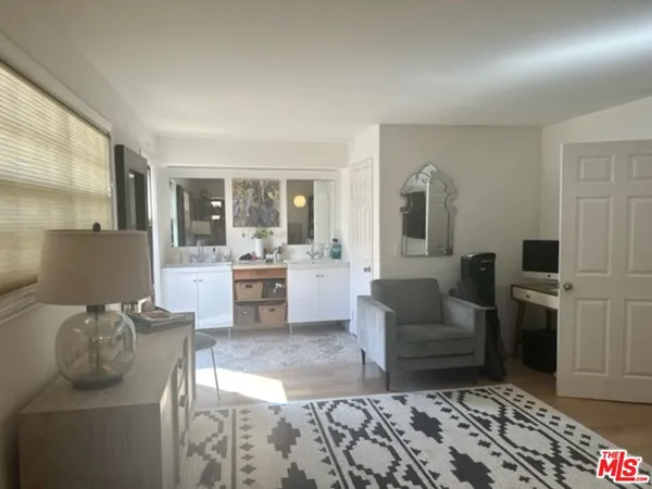 a living room with furniture and view of living room