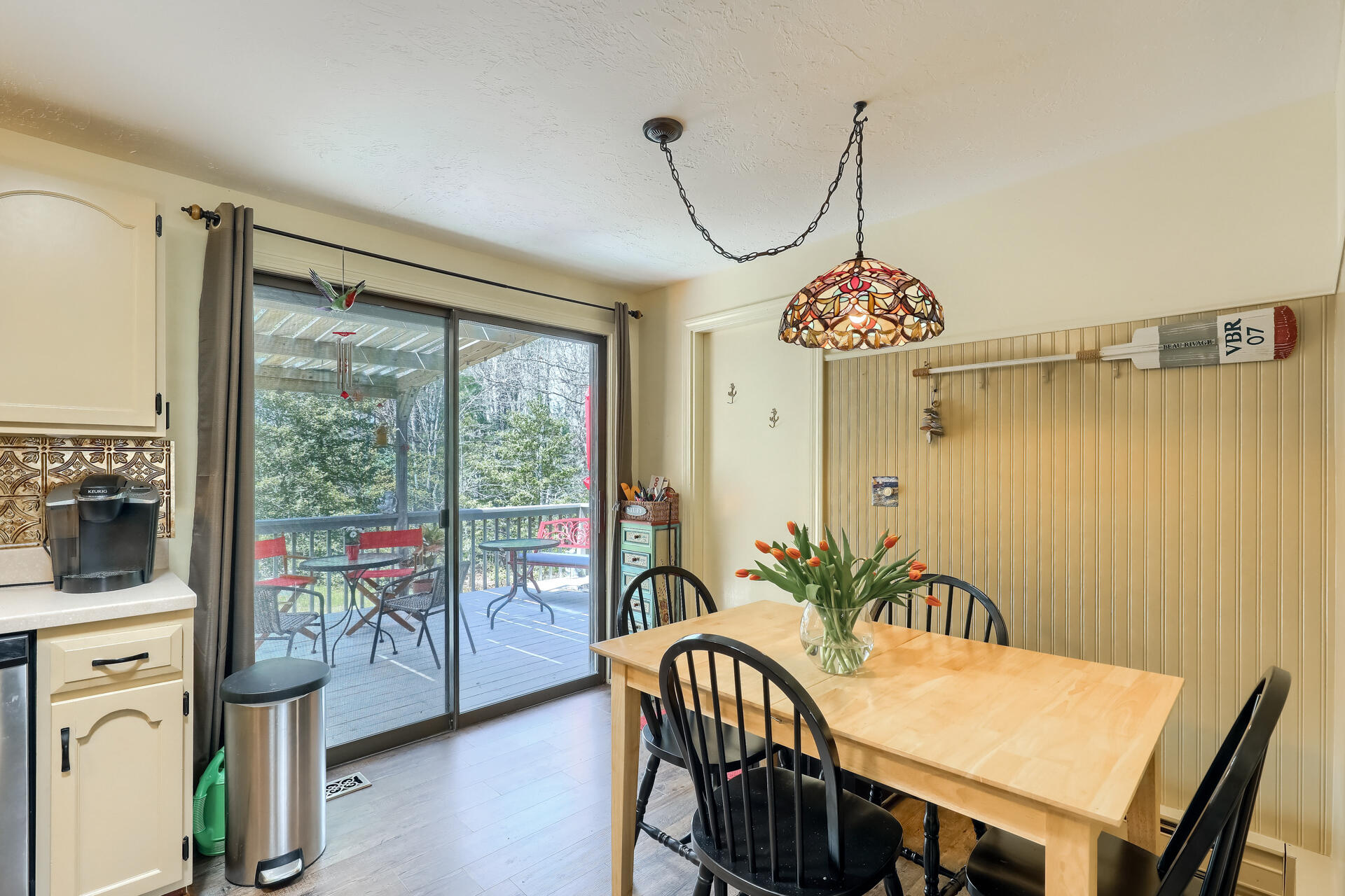 48 Gunstock Road Osterville, MA 02655 - Photo 13 of 28 a view of a dining room with furniture window and outside view
