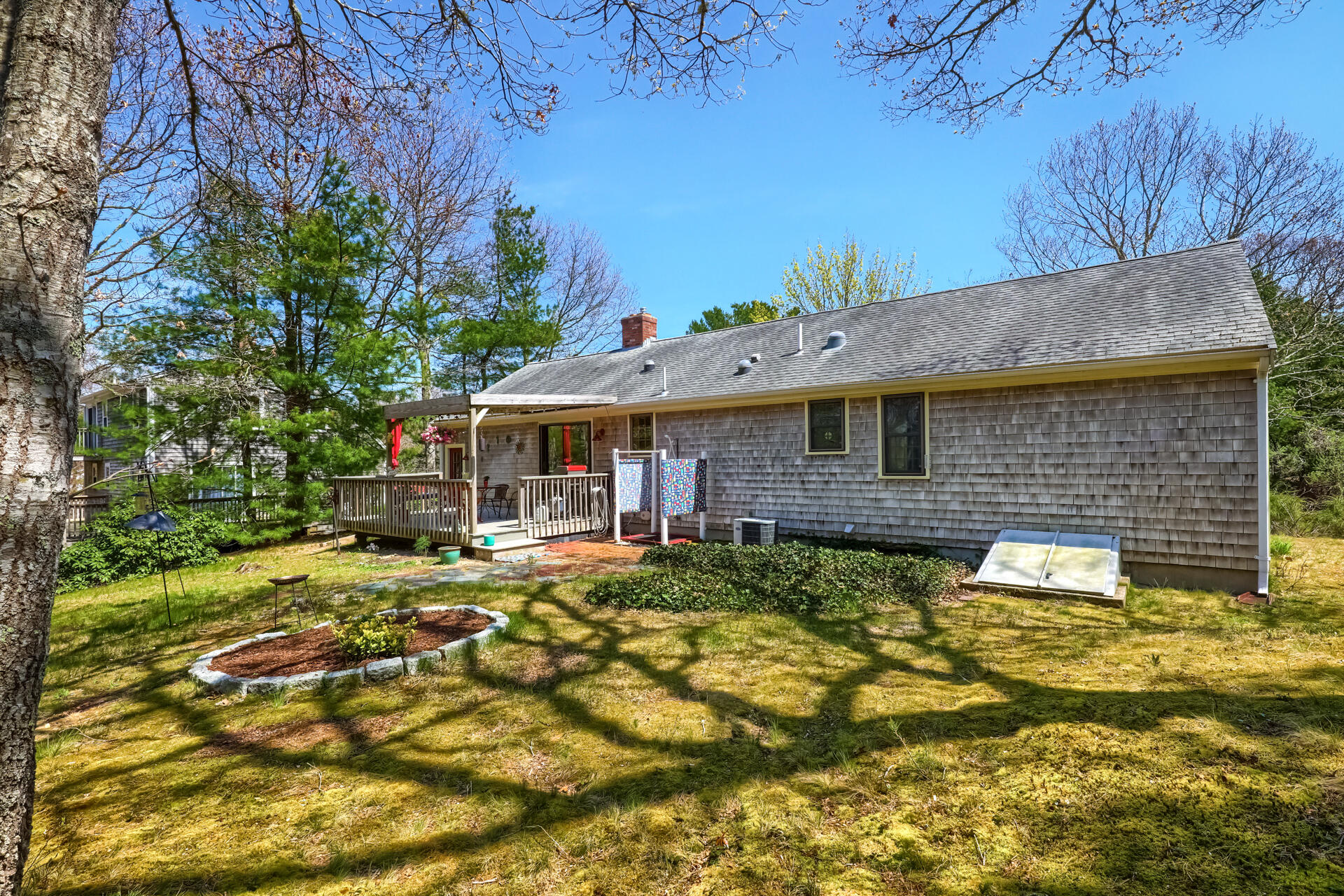 48 Gunstock Road Osterville, MA 02655 - Photo 27 of 28 a view of house with outdoor space