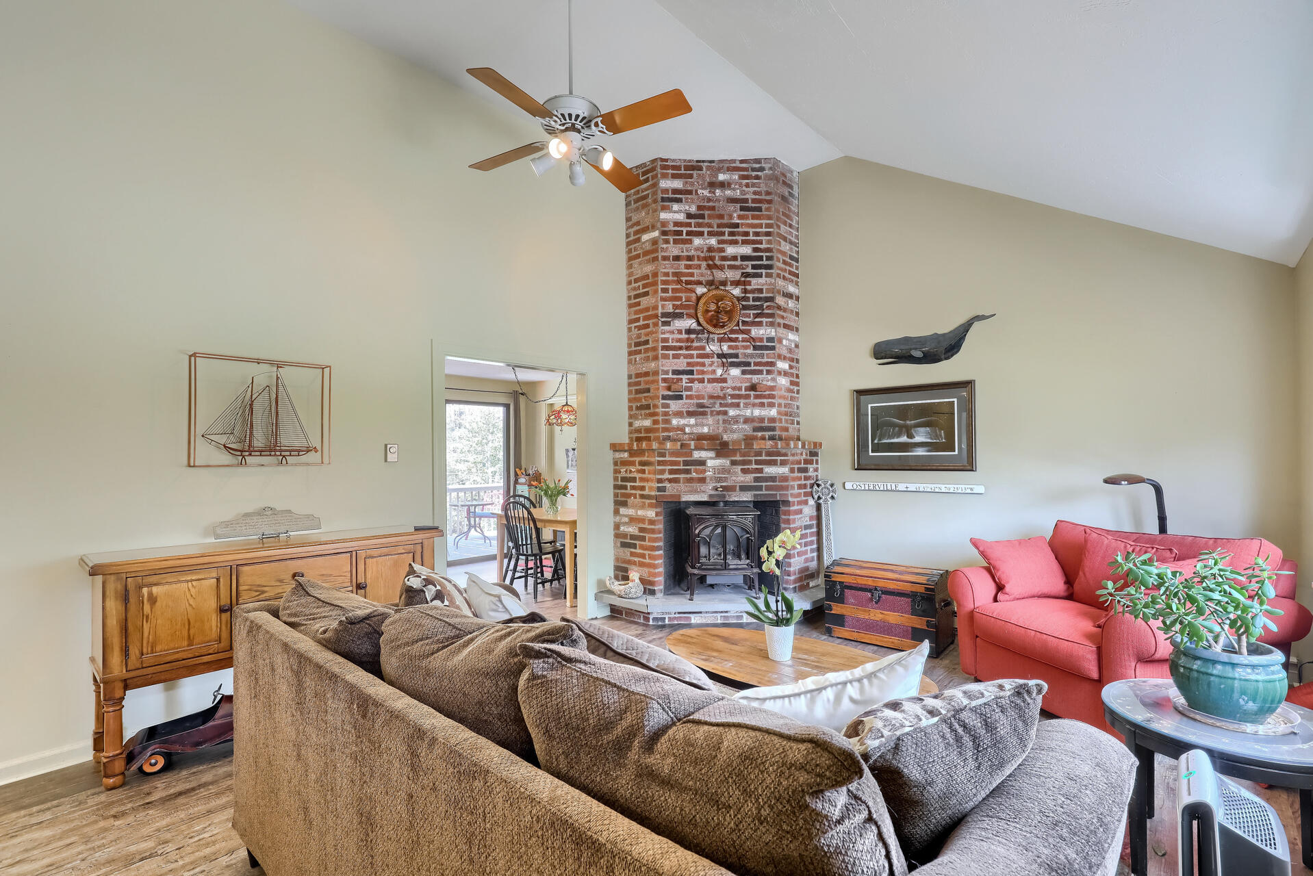 48 Gunstock Road Osterville, MA 02655 - Photo 6 of 28 a living room with furniture and a fireplace