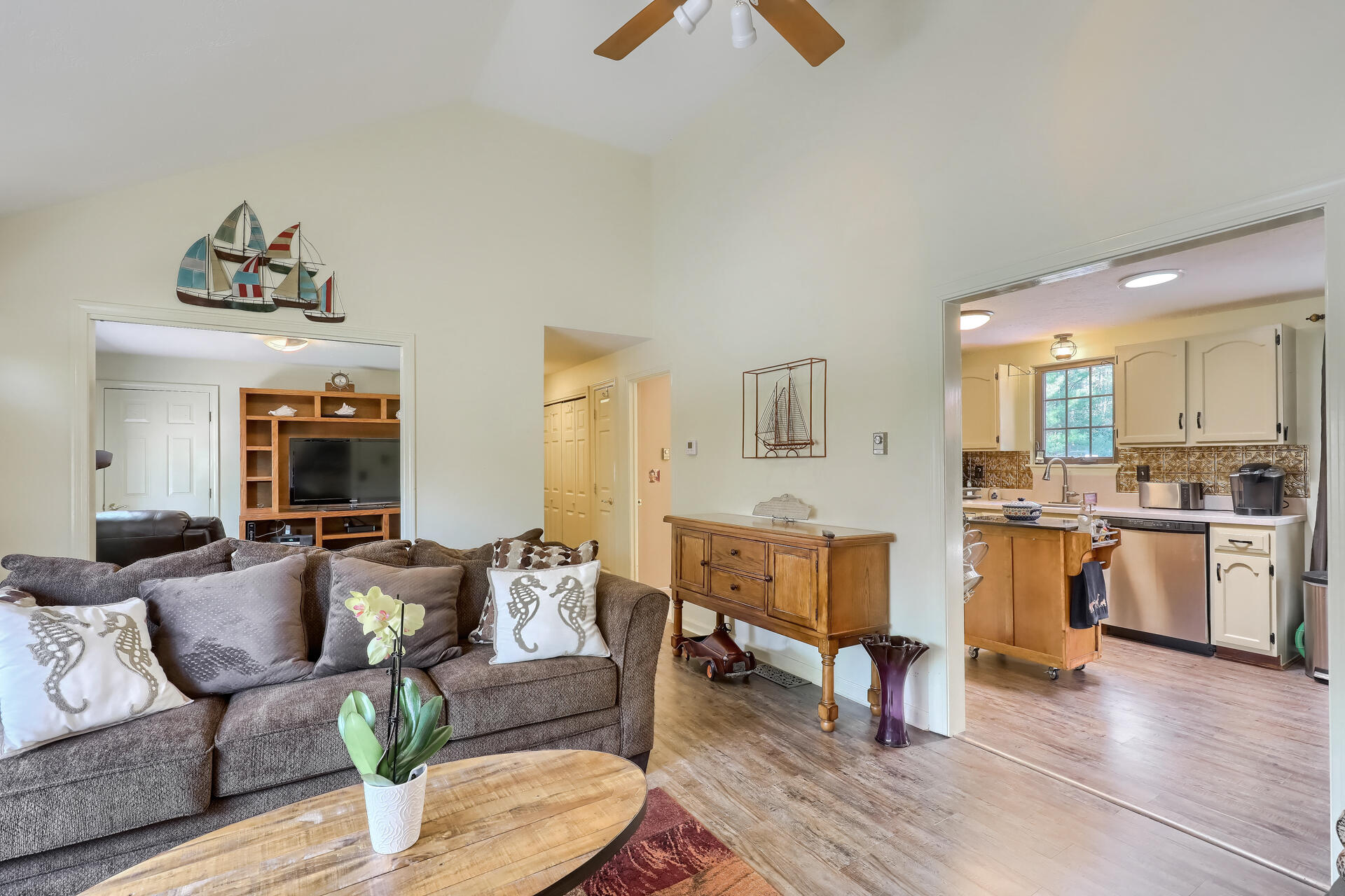48 Gunstock Road Osterville, MA 02655 - Photo 8 of 28 a living room with furniture and kitchen view
