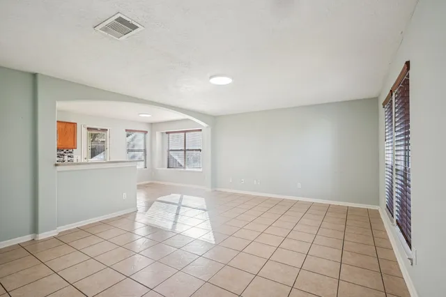 a view of an empty room and window