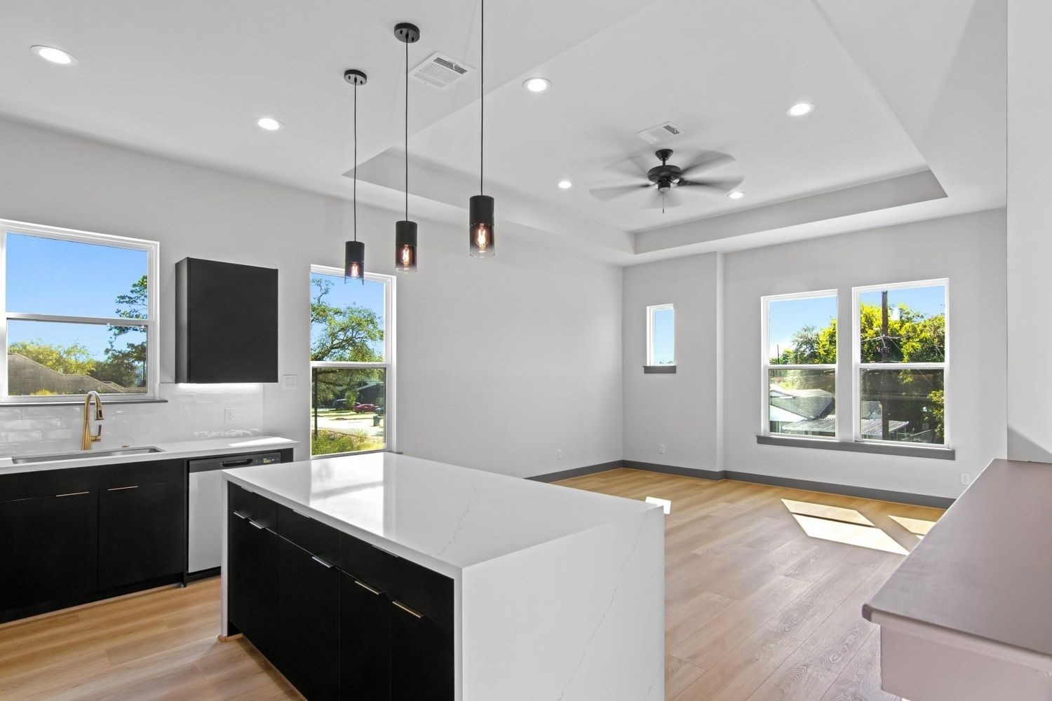 4805 Paula Houston, TX 77033 - Photo 11 of 44 a kitchen with kitchen island a sink stainless steel appliances and cabinets