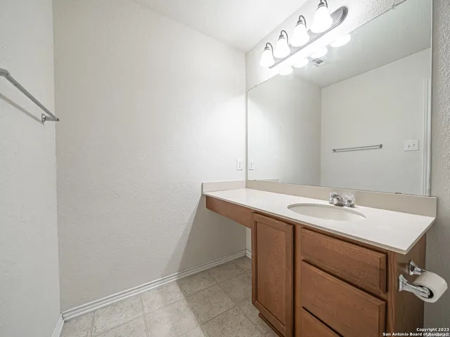 a sink with a mirror