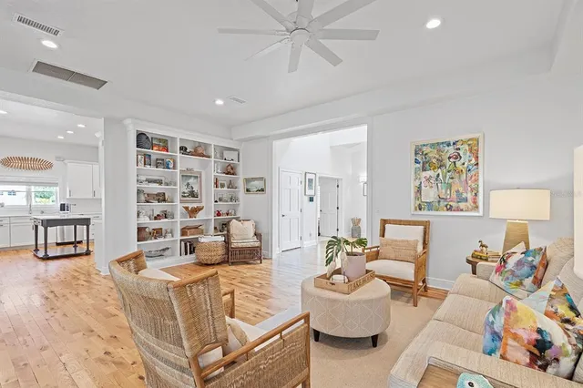 a bathroom with a sink mirror and toilet