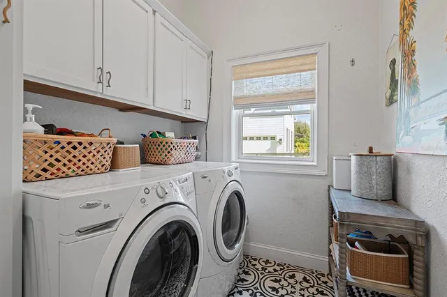 a bedroom with a bed couch and window