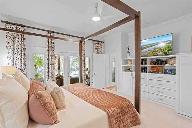 a bathroom with a sink a mirror a vanity and a shower
