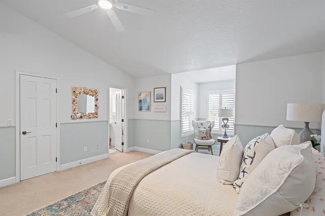 a view of a swimming pool with a yard